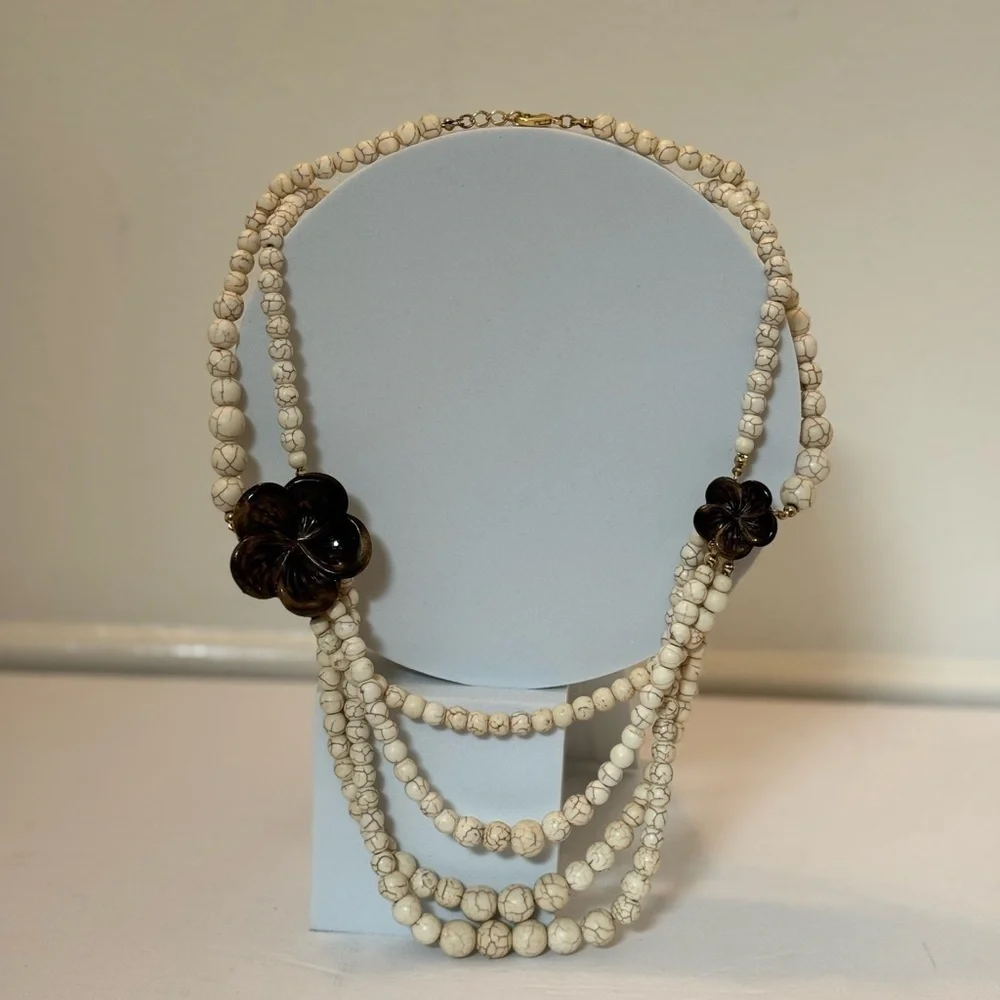 Gorgeous earth tone beaded necklace with brown floral accents